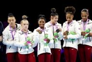 Simone Biles and Team USA with the gold medals at the 2023 World Artistic Gymnastics Championships.
